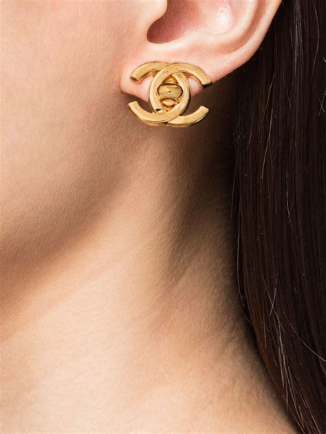 chanel earrings farfetch|chanel vintage cc earrings.